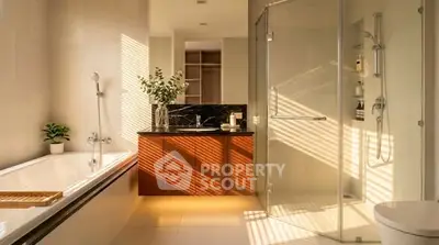 Luxurious modern bathroom with elegant bathtub and glass shower enclosure