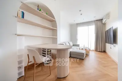 Modern living room with stylish furniture and natural light