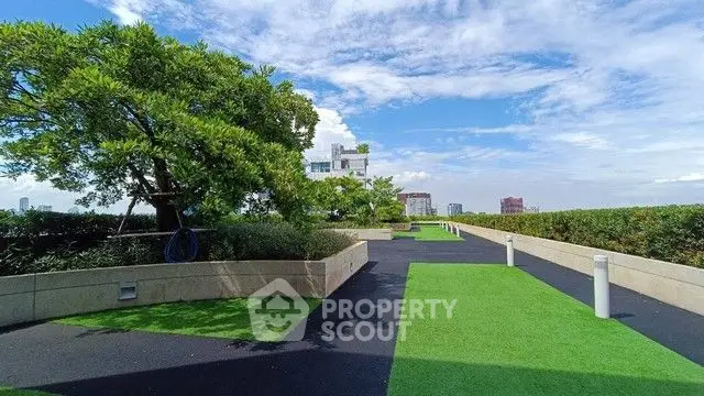 Stunning rooftop garden with lush greenery and city views