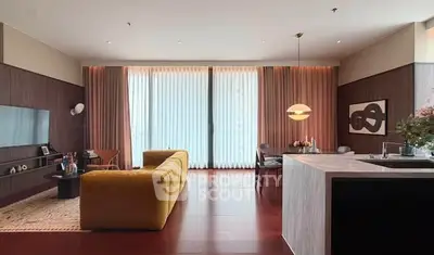 Luxurious modern living room with stylish decor and open kitchen layout