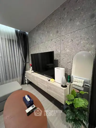 Modern living room with sleek TV setup and stylish decor