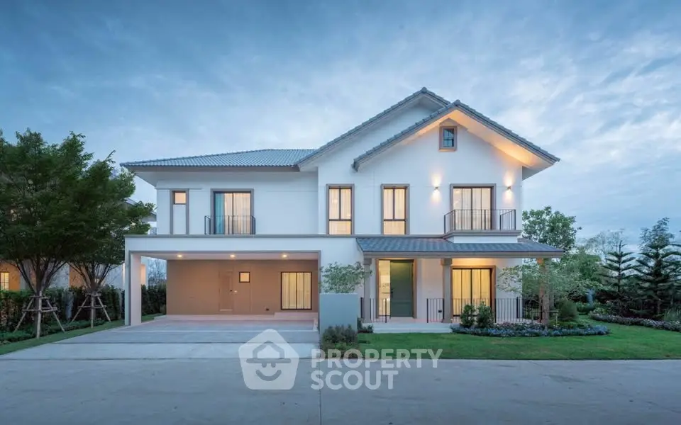 Stunning modern two-story house with spacious driveway and lush greenery, perfect for family living.