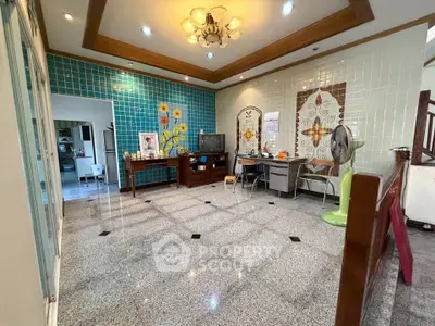 Spacious living room with tiled walls and modern decor