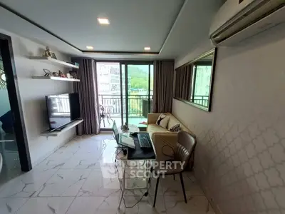 Modern living room with balcony view, sleek furniture, and natural light.
