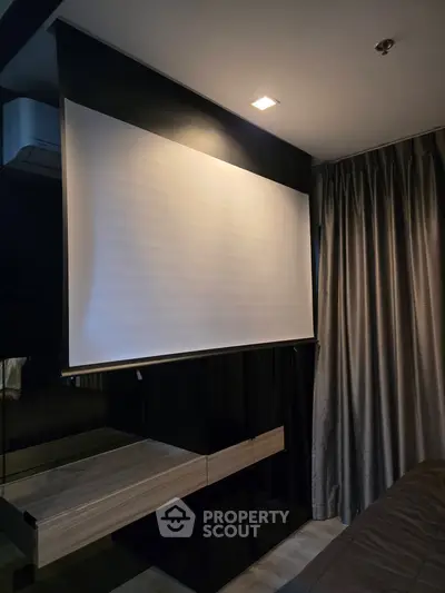 Modern living room with projector screen and elegant curtains