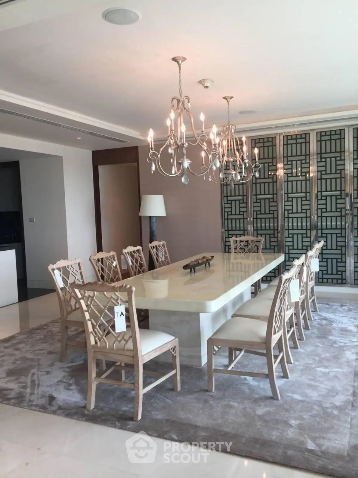 Luxurious dining room with elegant chandelier and stylish decor