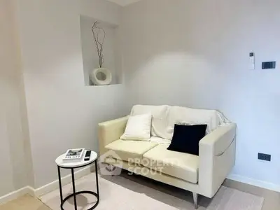 Cozy living room with modern decor and comfortable seating