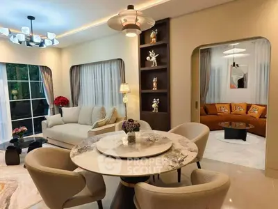 Luxurious modern living room with elegant decor and cozy seating area, perfect for relaxation and entertainment.
