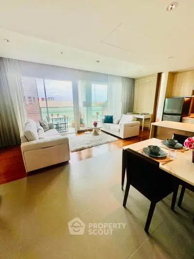 Spacious modern living room with balcony and elegant decor