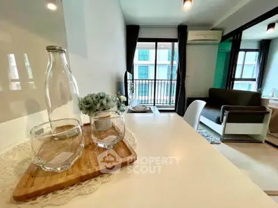 Modern living room with balcony view and stylish decor