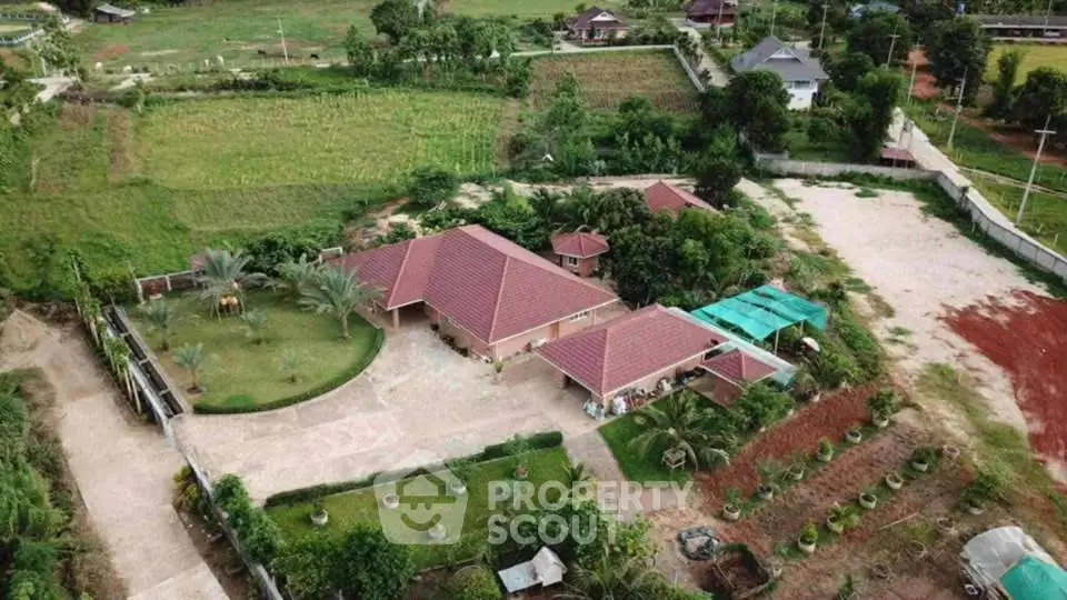 Expansive countryside estate with lush gardens and spacious grounds, perfect for serene living.