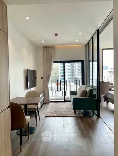 Modern living room with balcony view in high-rise apartment