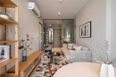 Modern living room with stylish decor and air conditioning