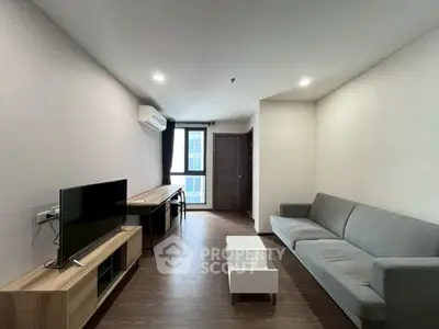 Modern living room with sleek furniture and natural light