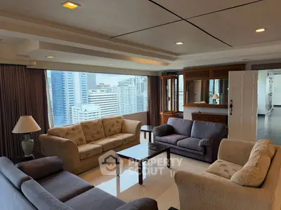 Spacious living room with city view, featuring elegant sofas and modern decor in a high-rise apartment.