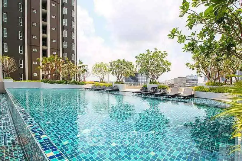 Luxurious rooftop pool with city skyline views and lush greenery