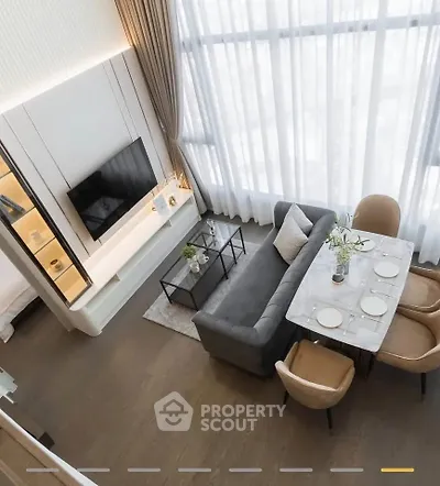Luxurious modern living room with high ceilings and elegant dining area