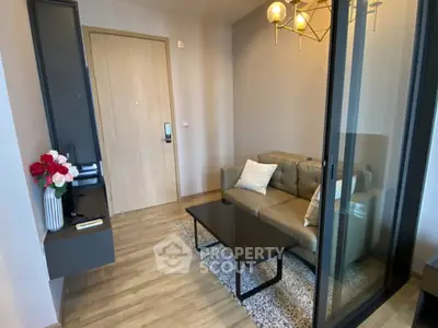 Modern living room with stylish decor and comfortable seating in a cozy apartment.