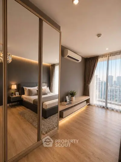 Luxurious bedroom with city view, featuring elegant decor and ample natural light.