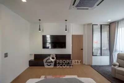 Modern living room with sleek TV setup and stylish decor