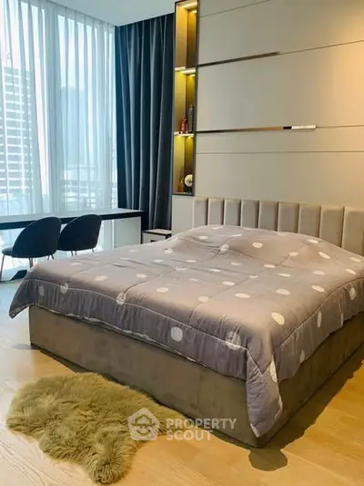 Luxurious modern bedroom with plush bedding and city view