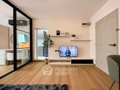 Modern living room with sleek design and wooden flooring
