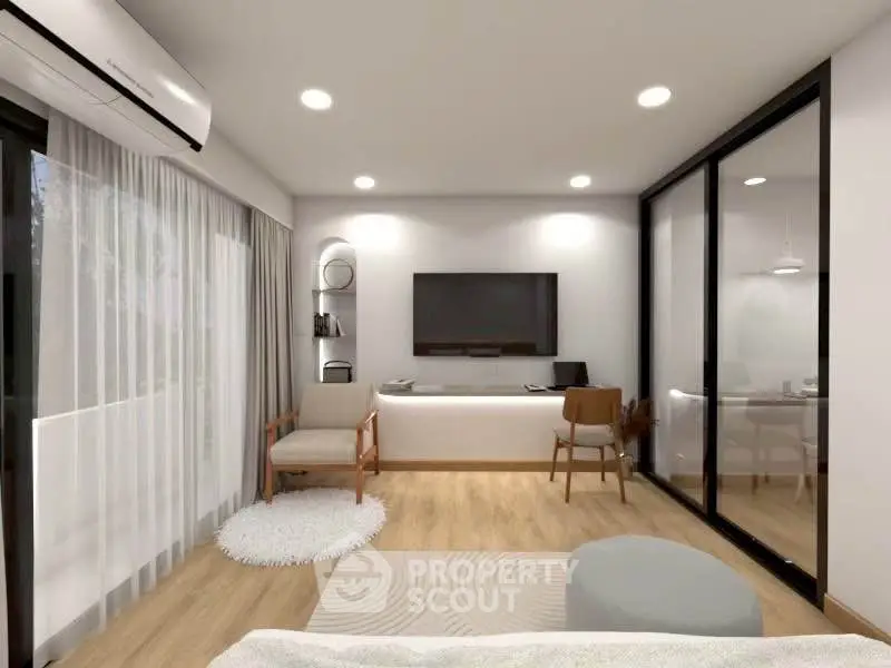 Modern living room with sleek design and large windows for natural light.