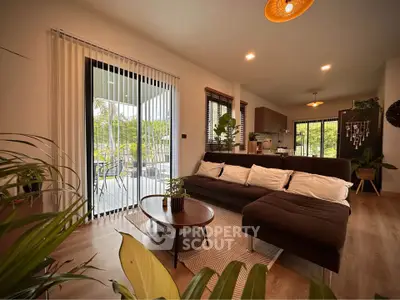 Modern living room with large windows and stylish decor