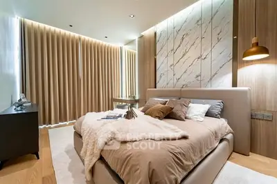 Luxurious modern bedroom with elegant decor and ambient lighting