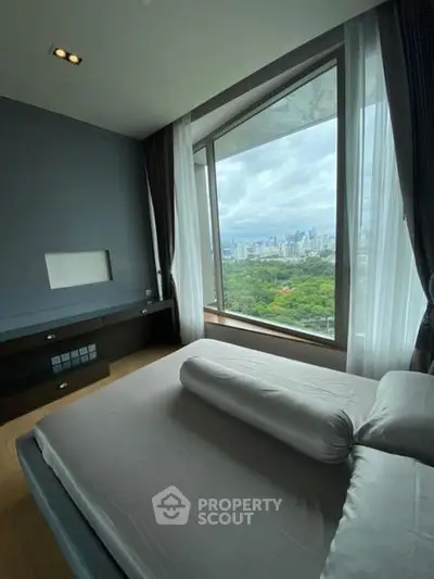 Luxurious bedroom with panoramic city view and modern decor
