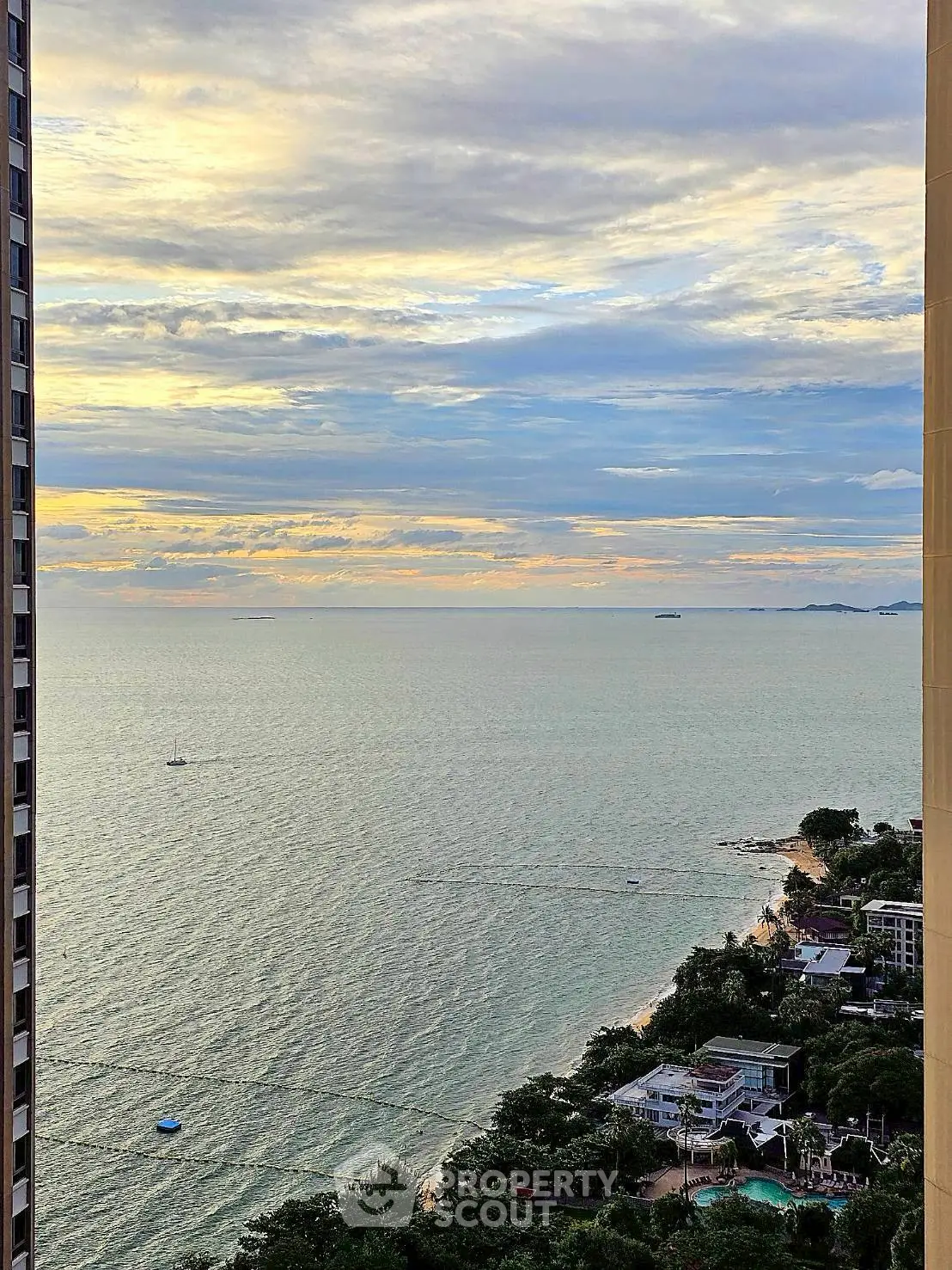 Stunning ocean view from high-rise apartment, perfect for serene living.