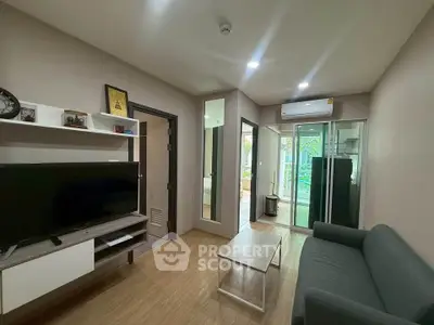 Modern living room with sleek furniture and balcony view