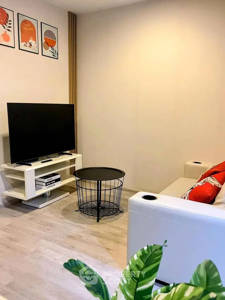 Modern living room with sleek TV setup and stylish decor