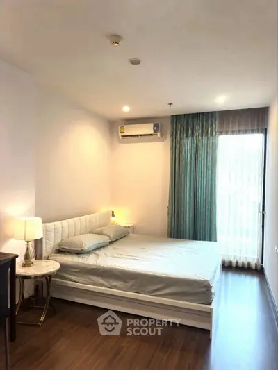 Cozy bedroom with natural light and elegant decor