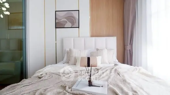 Luxurious bedroom with elegant decor and soft lighting, perfect for relaxation and comfort.