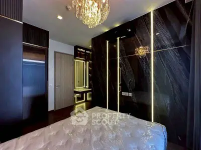 Luxurious bedroom with modern lighting and elegant decor