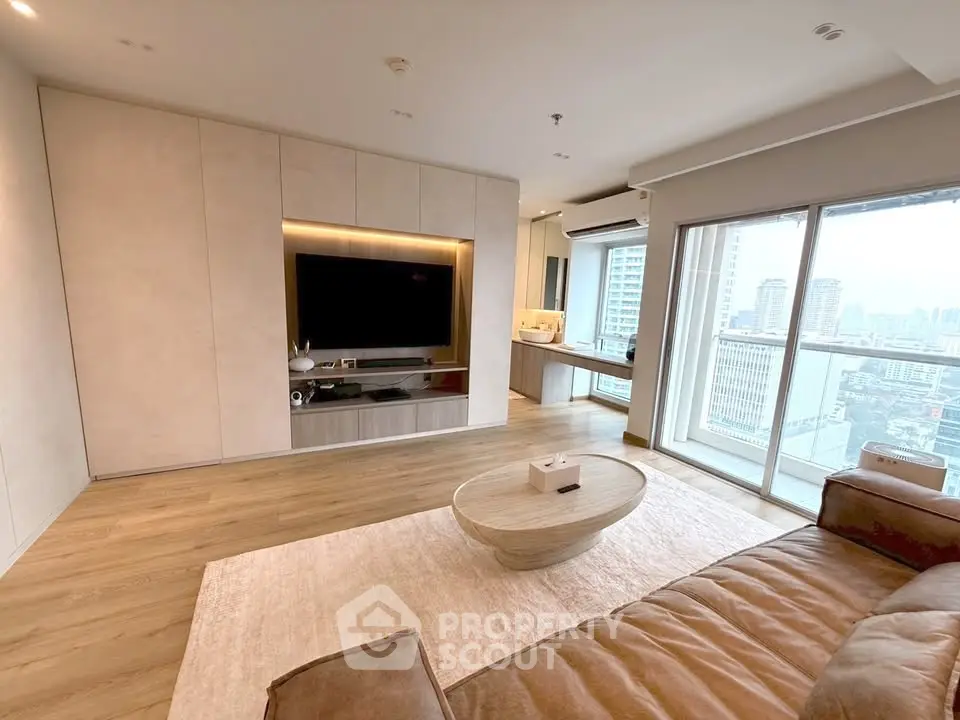 Spacious modern living room with city view and stylish decor