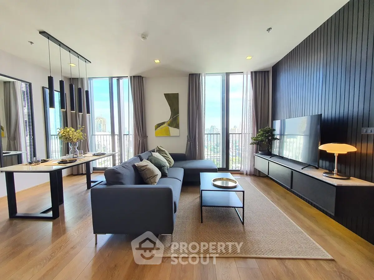 Luxurious modern living room with panoramic city views and elegant decor
