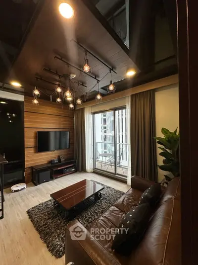 Modern living room with stylish lighting and balcony view