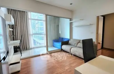 Spacious modern living room with large windows and stylish furniture