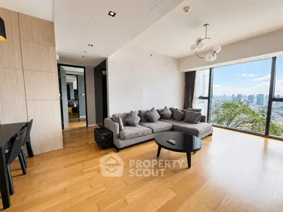 Spacious modern living room with city view and elegant decor