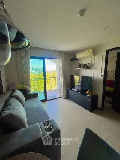 Modern living room with balcony view and sleek furniture