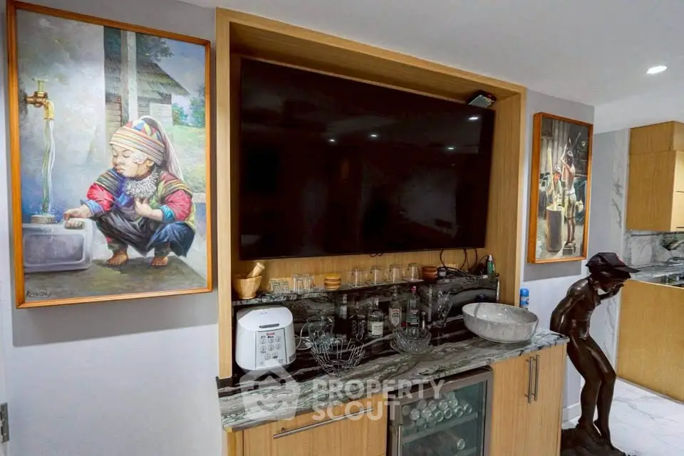 Stylish living room with modern entertainment center and unique art pieces