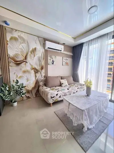 Elegant living room with floral decor and natural light