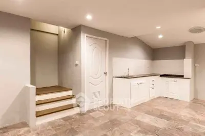 Modern kitchen with sleek design and ample storage space