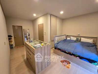 Spacious bedroom with modern wooden furniture and cozy decor