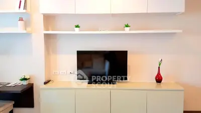 Modern living room with sleek TV setup and minimalist decor