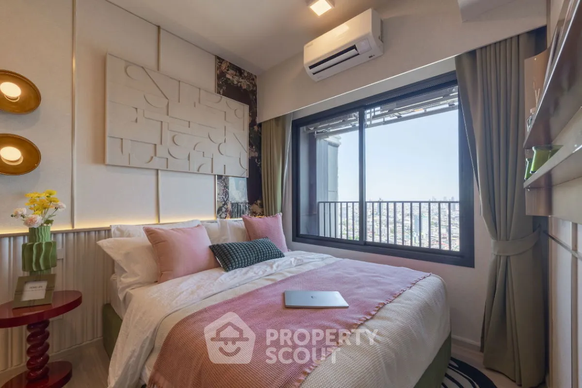 Chic bedroom with city view, modern decor, and cozy ambiance