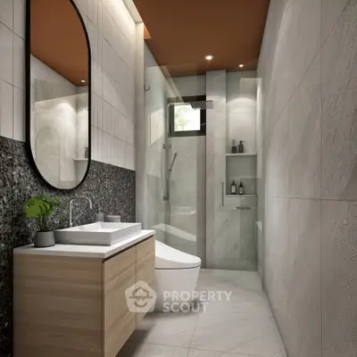 Modern bathroom with sleek design and glass shower enclosure