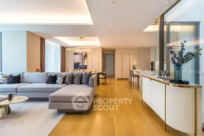 Luxurious open-plan living room with modern decor and elegant lighting